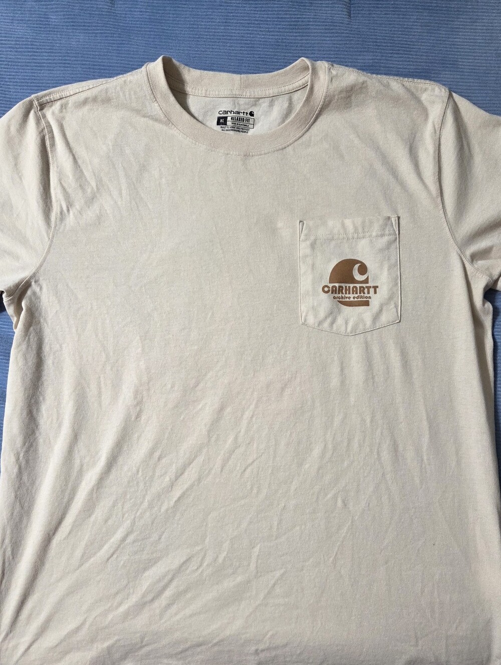 Carhartt Men’s Short-Sleeve Pocket Tee in Cream with Brown Logo
